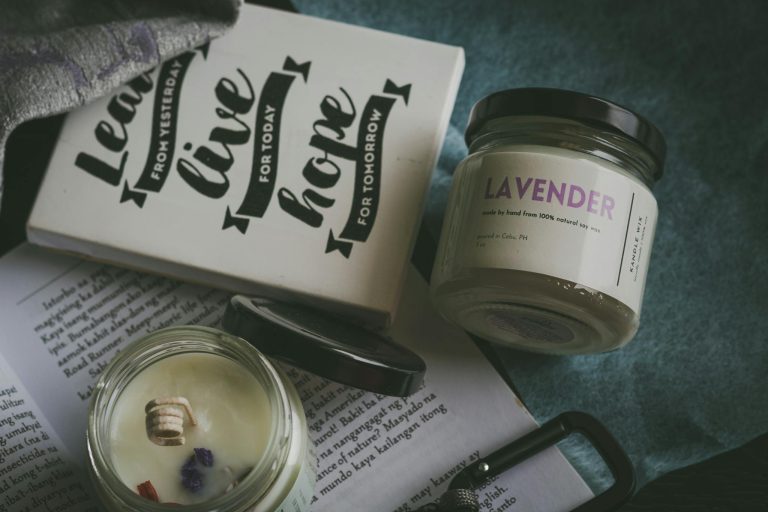 Cozy setup with lavender candles and inspirational quotes creates a calming atmosphere.
